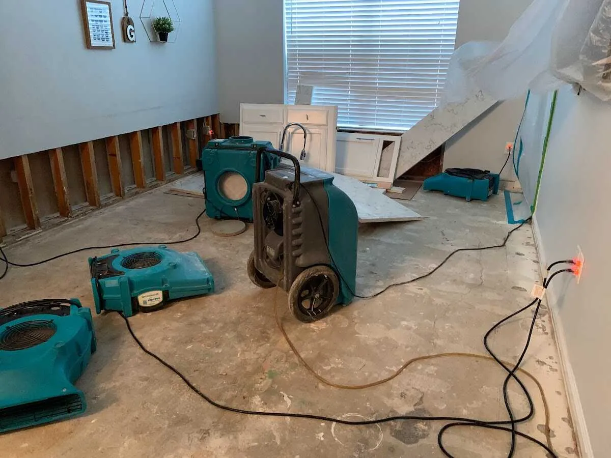 Dehumidifier in flood-cut room for Water Damage Restoration in Winchendon